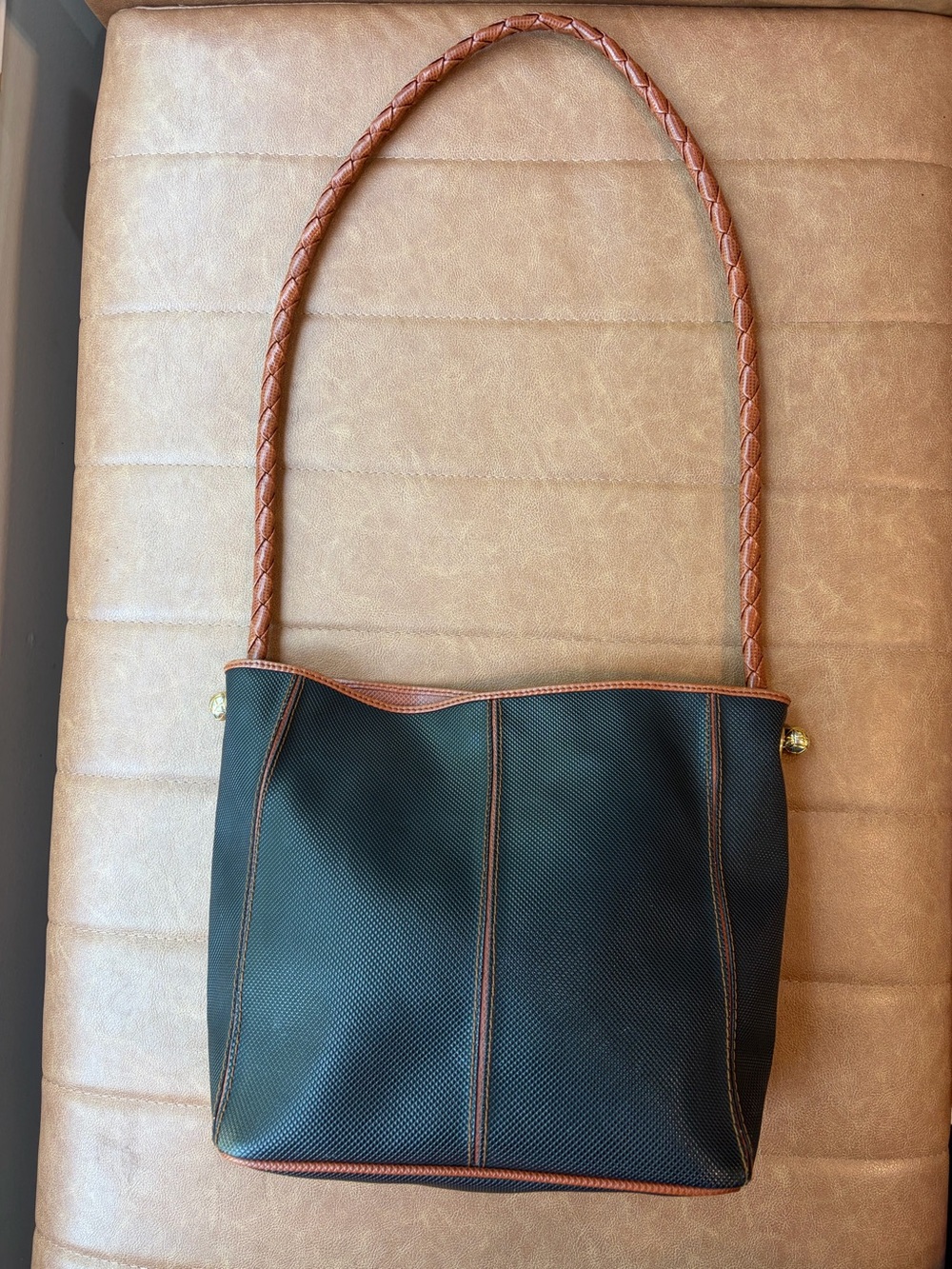 Bottega Veneta shoulder bag featuring a woven rope strap